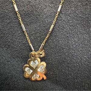 14k European yellow gold chain with four leaf clover pendant